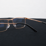 Cartier CT0227 gold metal full-rim unisex eyeglass side view